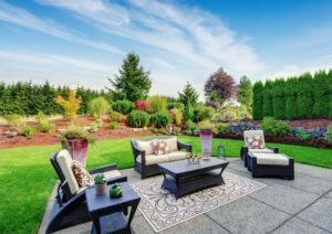 3 luxury lounge chairs in backyard with beautiful landscape